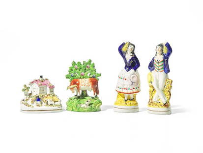 A Group of Four Staffordshire Figures or Figural Groups: A Group of Four Staffordshire Figures or Figural Groups England, Circa 1850-1860 comprising a pair of figures depicting a sailor and lass, and two bocage groups, including a cow with dog and a cottage