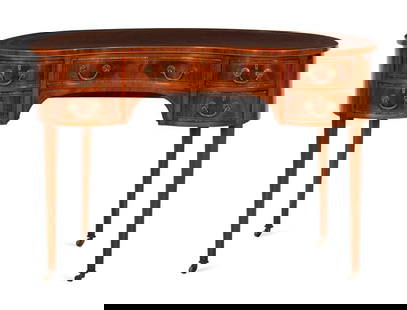 A George III Style Mahogany Crossbanded Reniform Writing Table: A George III Style Mahogany Crossbanded Reniform Writing Table 20th Century Height 30 x width 47 x depth 24 inches. This lot is located in Palm Beach. Con