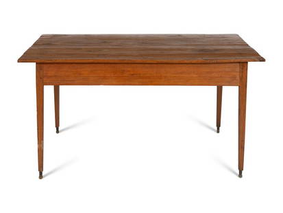 An American Yellow Pine Table: An American Yellow Pine Table 19th Century Height 29 x width 60 x depth 44 inches. This lot is located in Palm Beach. Condition On later caster