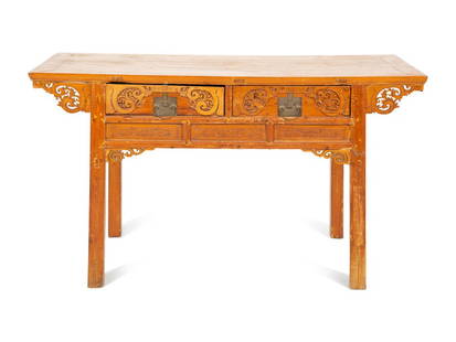 A Chinese Carved Hardwood Altar Table: A Chinese Carved Hardwood Altar Table 19th Century Height 35 x width 61 x depth 27 inches. Property from the Collection of Ms. Terry Van Lear, Palm Beach, Florida This lot is lo