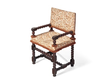 A Baroque Walnut Turned and Carved Barley Twist Armchair