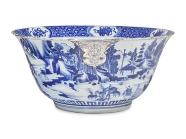 A Chinese Export Porcelain Blue and White Punch Bowl with Silver Make-Do Repair Bearing the Arms of