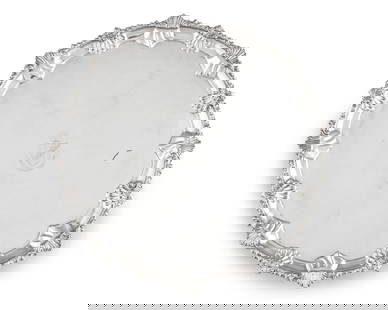 A Victorian Sterling Silver Salver in the George III Style: A Victorian Sterling Silver Salver in the George III Style Charles Stuart Harris, London, 1897 with molded rim on scrolled feet, engraved to center with shield-form armorial crest surmounted by eagle