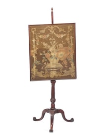 A George III Carved Mahogany Fire Screen With Petit Point Needlework Panel