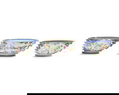 Three Chinese Export Porcelain Famille Rose Punch Bowls: Three Chinese Export Porcelain Famille Rose Punch Bowls Late 18th Century two with blue floral ground and borders, each bearing reserves depicting figures in landscapes, bearing red-painted accession
