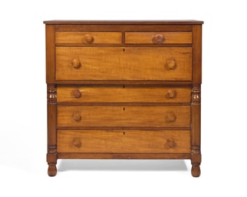 A Late Federal or Classical Cherry and Figured Maple Chest of Drawers