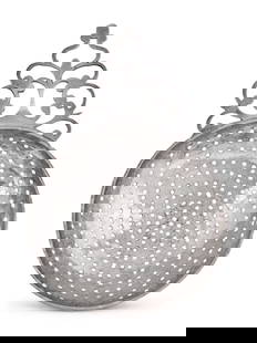 A Silver Tea Strainer: A Silver Tea StrainerThomas Shields (1743-1819), Philadelphia, PA, Circa 1770 with foliate pierced handle, marked twice to