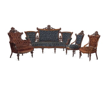 A Four-Piece Renaissance-Revival Carved Walnut And Burl-Walnut Veneered Parlor Suite