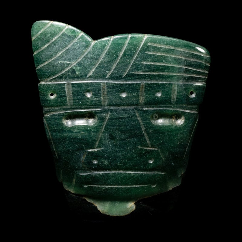 A Costa Rican Jade God Pendant: A Costa Rican Jade God Pendant Circa 500-1000 A.D. Height 4 1/8 inches (10.48 cm). This lot is located in Chicago. Size Height 4 1/8 inches (10.48 cm). Provenance<