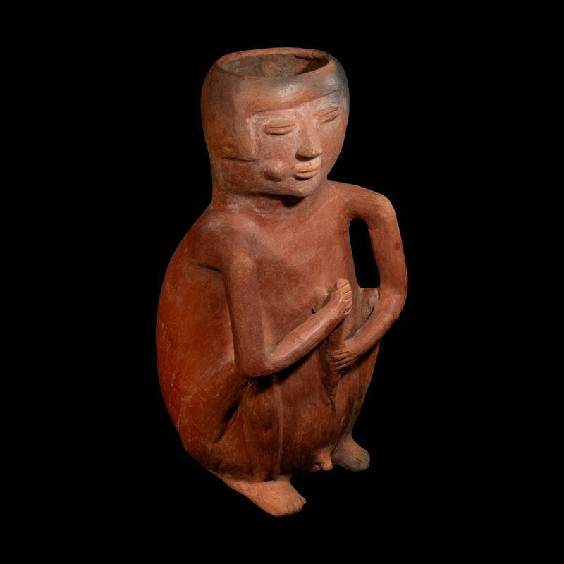 A Nariño-Capuli Redware Figural Vessel: A Nariño-Capuli Redware Figural Vessel Colombia, Circa 500-1000 A.D. Height 19 3/8 inches (49.21 cm). This lot is located in Chicago. Size Height 19 3/8 inches (49.21