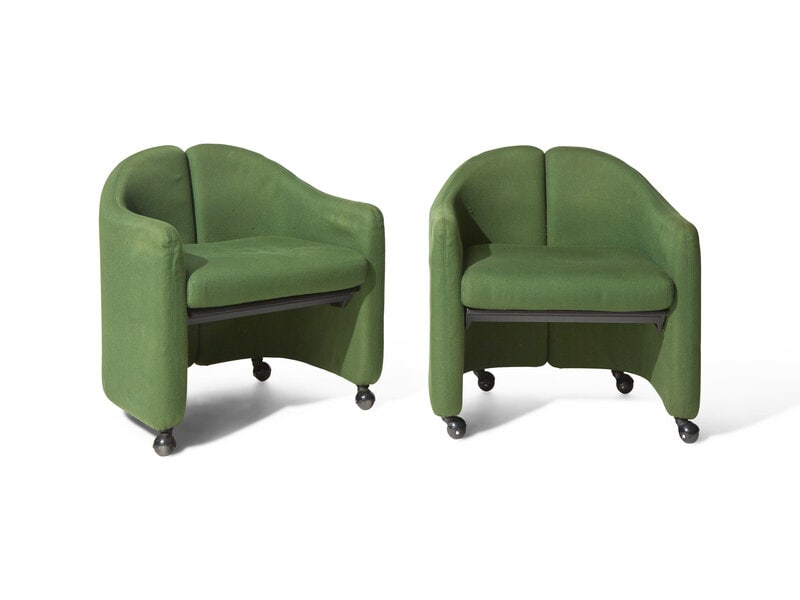 BILLY COTTON A Pair of Italian Split-Back Lounge Chairs: BILLY COTTON A Pair of Italian Split-Back Lounge Chairs Eugenio Gerli for Tecno, Circa 1960s Covered in a green upholstery and raised on casters. Height 26 x width 26 x d