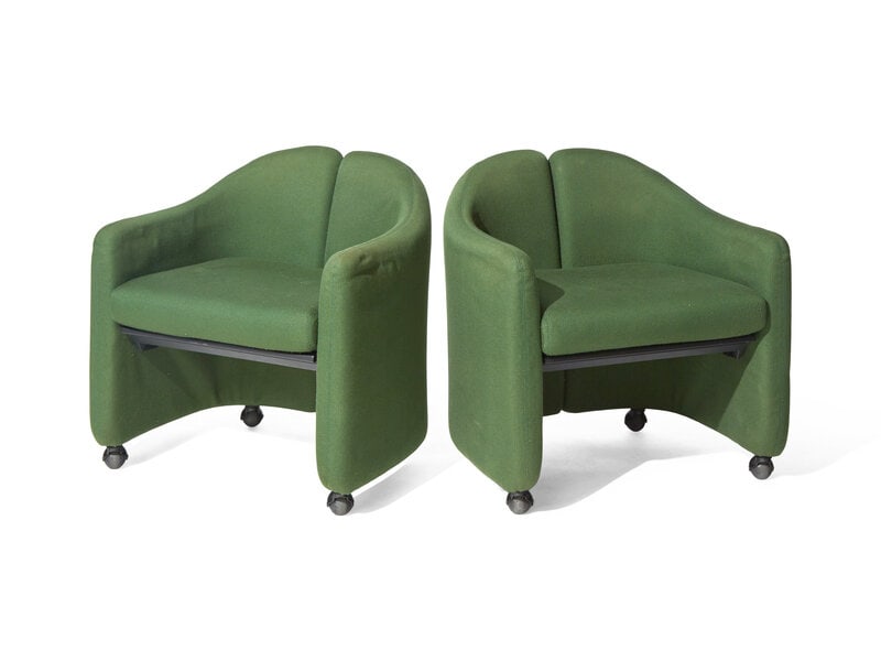 BILLY COTTON A Pair of Italian Split-Back Lounge Chairs: BILLY COTTON A Pair of Italian Split-Back Lounge Chairs Eugenio Gerli for Tecno, Circa 1960s Covered in green upholstery and raised on casters. Height 26 x width 26 x dep