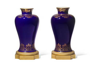 JAMIE DRAKE
A Pair of Sevres Porcelain 'Bleu du Roi' Parcel-Gilt and Gilt-Bronze Mounted Vases
