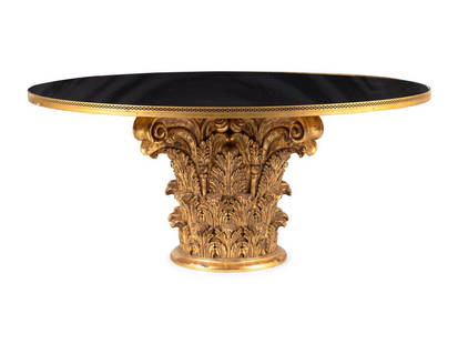 A Regency Style Brass Mounted Black Granite and Giltwood Center Table: A Regency Style Brass Mounted Black Granite and Giltwood Center Table 20th Century Height 29 1/2 x diameter 67 inches. This lot is located in Chicago. Cond