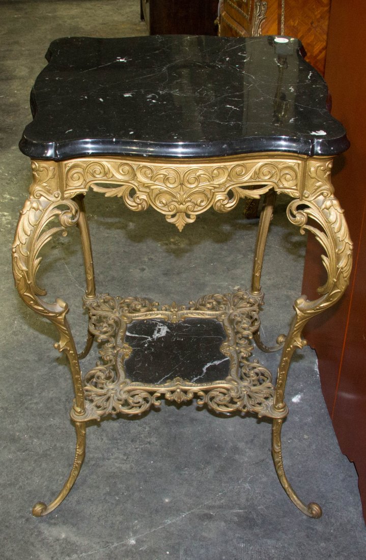 A Neoclassical Style Gilt Metal and Marble Occasional T: A Neoclassical Style Gilt Metal and Marble Occasional Table, having a shaped square top over a pierce carved frieze, raised on cabriole legs joined by a marble inset medial shelf, the whole with cast 