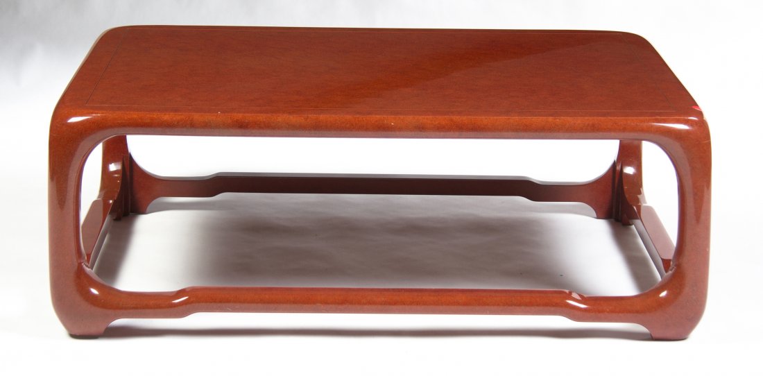 A Lacquered Low Table, in the manner of Karl Springer, : A Lacquered Low Table, in the manner of Karl Springer, in the Chinese taste, having a rectangular top, joined by stretchers. Height 16 3/4 x width 48 x depth 32 inches.