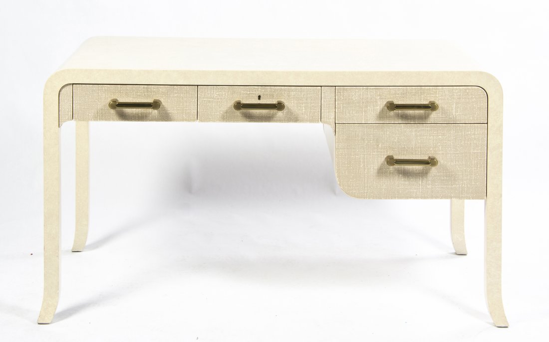 A Faux Parchment Veneered Writing Desk, in the manner o: A Faux Parchment Veneered Writing Desk, in the manner of Karl Springer, the rectangular top over four drawers raised on square legs. Height 30 x width 53 1/2 x depth 26 7/8 inches.