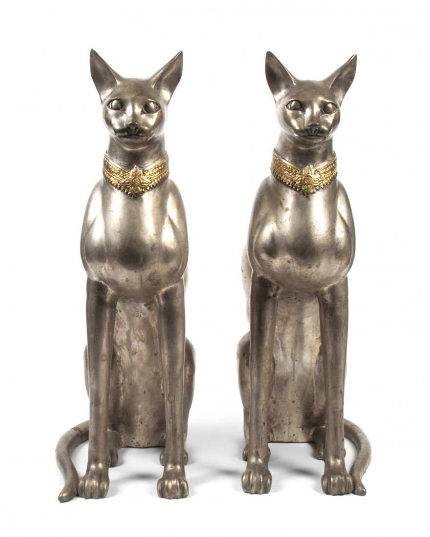 A Pair of Cast Metal Models of Seated Cats, Height 24 1: A Pair of Cast Metal Models of Seated Cats, each depicted with a gold collar. Height 24 1/8 inches.