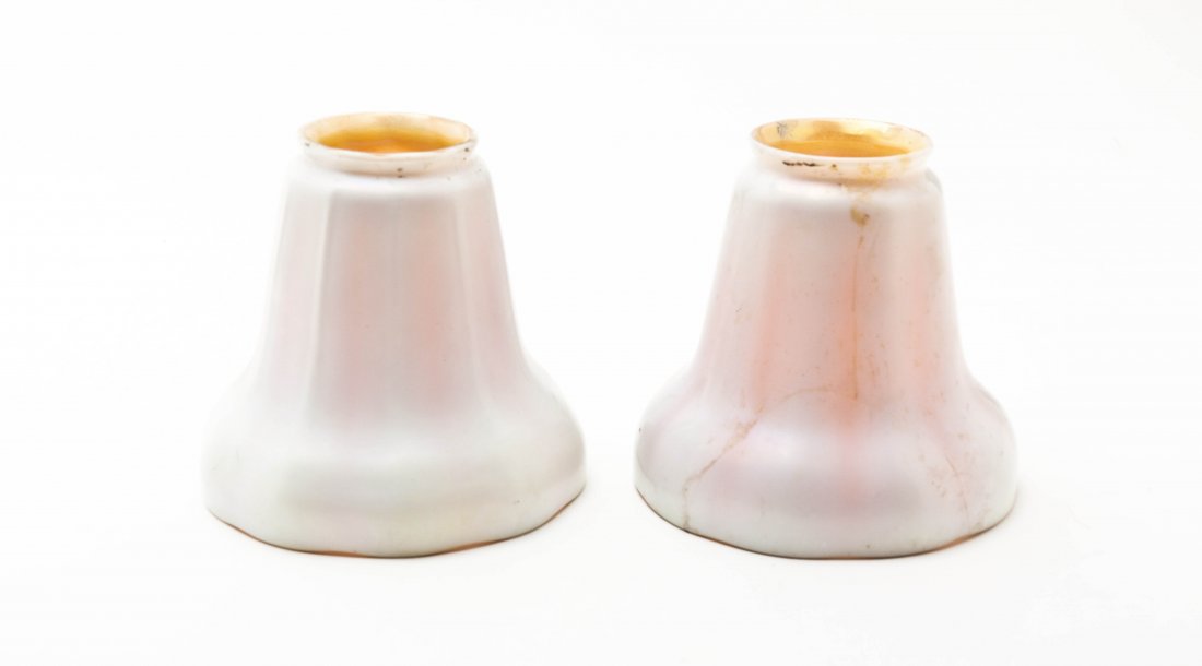 A Steuben Calcite Glass Shade, Height 4 5/8 inches.: A Steuben Calcite Glass Shade, of flared ribbed form, having an aurene interior, together with an associated other. Height 4 5/8 inches.