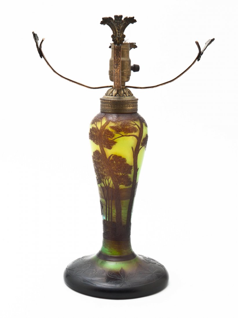 A J. Michel Cameo Glass Lamp Base, Height of glass 8 1/: A J. Michel Cameo Glass Lamp Base, having landscape decoration, signed in cameo to the base J. Michel Paris, drilled for electricity. Height of glass 8 1/4 inches.