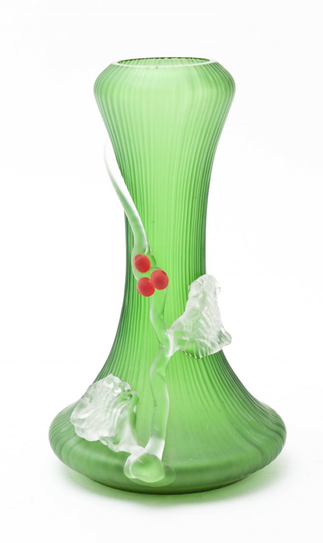 A Loetz Glass Vase, Height 8 1/8 inches.: A Loetz Glass Vase, of baluster form, the ribbed green body having applied leaf and berry decoration, etched Loetz Austria to the base. Height 8 1/8 inches.