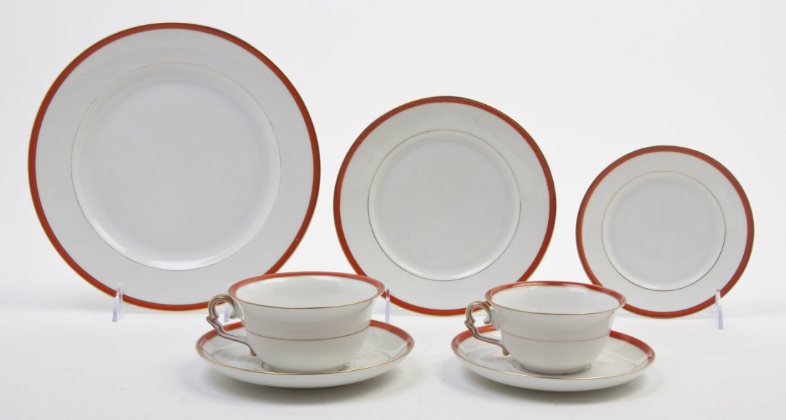 A K.P.M. Partial Dinner Service, Diameter of dinner pla: A K.P.M. Partial Dinner Service, in the Koralle pattern, having gilt and polychrome borders comprising 11 dinner plates, 10 luncheon plates, 11 bread plates, 12 coffee cups and saucers and 11 teacups
