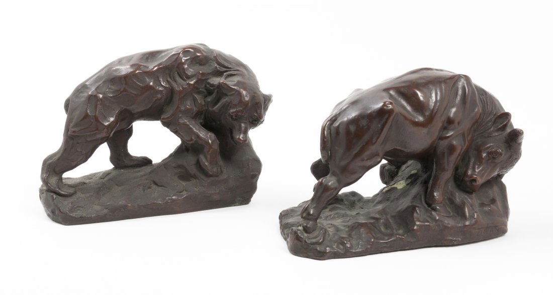 A Pair of American Bronze-Clad Plaster Animalier Booken: A Pair of American Bronze-Clad Plaster Animalier Bookends, Dean for Kathodian Bronze Works, comprising a bull and a bear. Length of longer 10 inches. Property from the Collection of Yolanda Pope, Hins