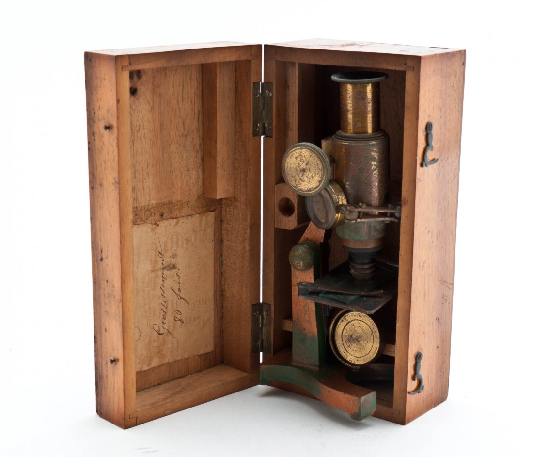 A French Brass Microscope, Height 6 7/8 inches.: A French Brass Microscope, with 80x magnification, contained in a fitted case. Height 6 7/8 inches. Property from the Collection of David H. Gee, Chicago, Illinois