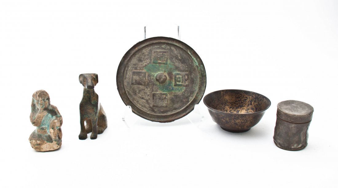 A Chinese Bronze Mirror, Width of widest 6 1/8 inches.: A Chinese Bronze Mirror, together with a metal caddy, a porcelain footed bowl, a metal model of a dog and a stone figure. Width of widest 6 1/8 inches.