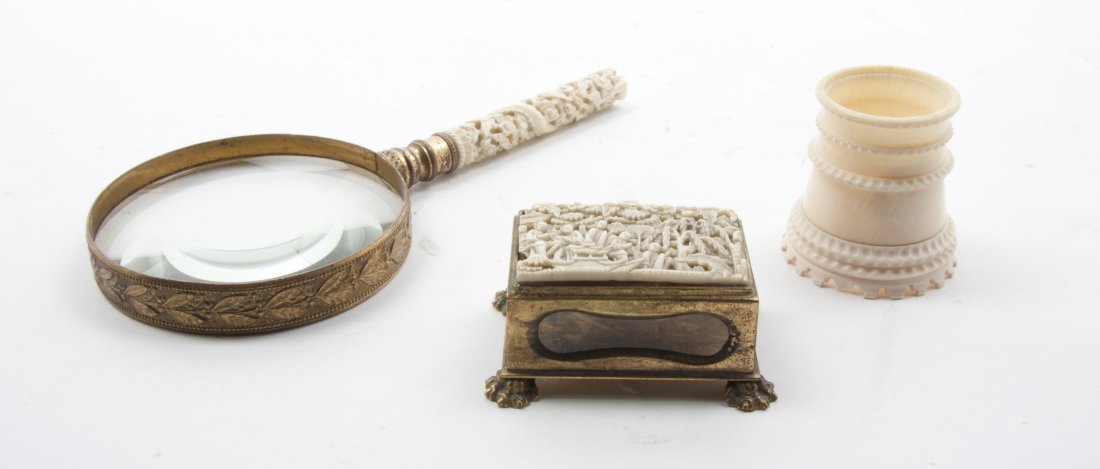 A Chinese Magnifying Glass with Ivory Carved Handle, Le: A Chinese Magnifying Glass with Ivory Carved Handle, having carving in high relief throughout with a sinuous dragon, together with another Chinese figural ivory panel set into a gilt metal match box. 
