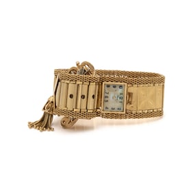 YELLOW GOLD AND DIAMOND SURPRISE WATCH