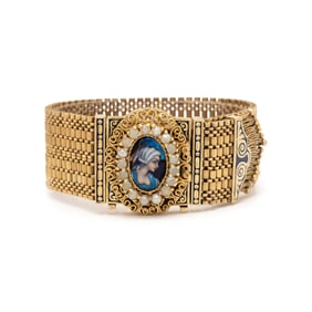 YELLOW GOLD, SEED PEARL, AND ENAMEL CONVERTIBLE SURPRISE WATCH