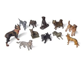 A Collection of Eleven Cast and Painted Metal Dog Figures