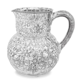 A Tiffany and Co. Silver Repousse Water Pitcher