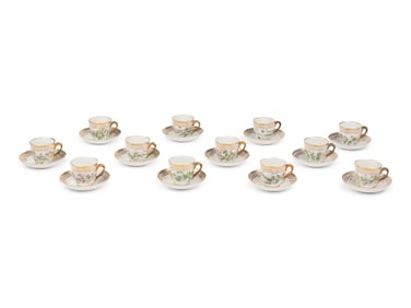 A Set of Twelve Royal Copenhagen Flora Danica Porcelain Teacups and Saucers