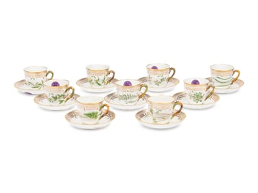 A Set of Nine Royal Copenhagen Flora Danica Porcelain Teacups and Saucers