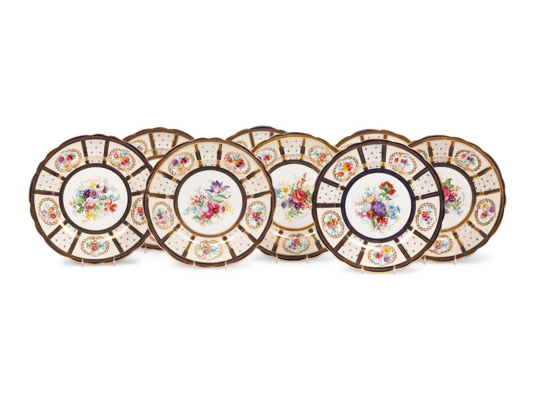 A Set of Eight English Porcelain Dinner Plates: A Set of Eight English Porcelain Dinner Plates Early 20th Century the pattern a reproduction of a service made for Queen Mary, each marked Fine Bone China/Made in England to underside; retailed by Sak