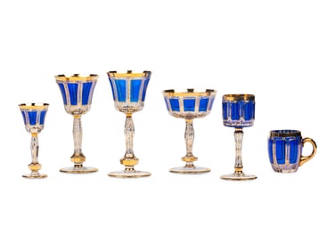 A Set of Moser Cobalt Blue and Gilt Decorated Glass Stemware
