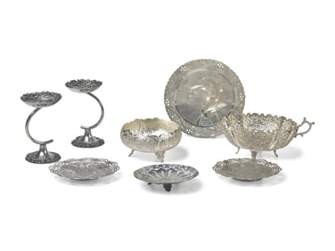 A Group of Eight Persian Silver Table Articles