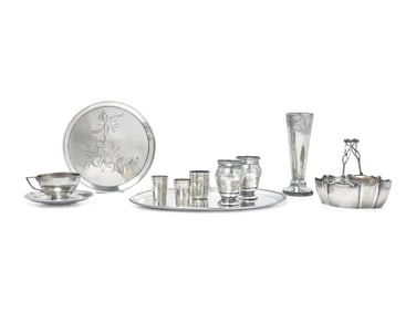 A Group of Eleven Russian Silver Table Articles