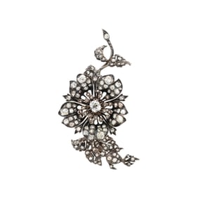 SILVER-TOPPED GOLD AND DIAMOND 'EN TREMBLANT' BROOCH