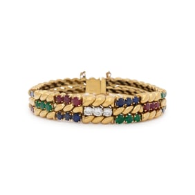 MAUBOUSSIN, FRENCH, YELLOW GOLD, EMERALD, DIAMOND, RUBY, AND SAPPHIRE BRACELET