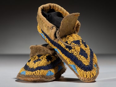 Sioux Child's Beaded Buffalo Hide Moccasins