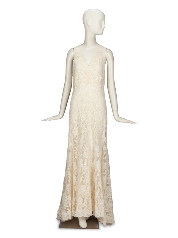 Monique Lhullier, Cream Lace Gown: Monique Lhullier, Cream Lace Gown Sleeveless gown in cream Alençon lace; sheer. V neckline. Fitted waist & flared skirt. Invisible zipper closure at side bodice. With matching Monique Lh