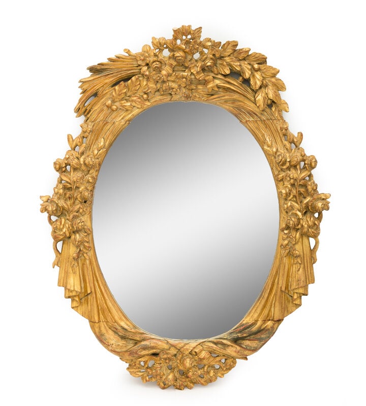 A Large Continental Giltwood Oval Mirror (1 of 2)
