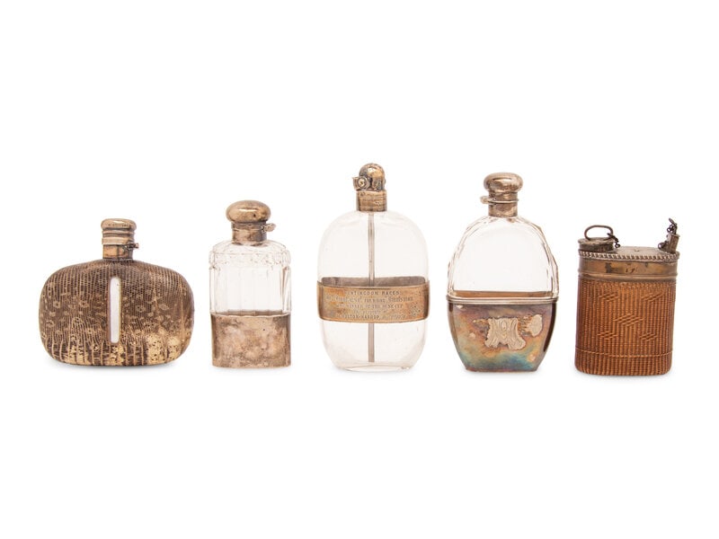 A Group of Five Silver, Reed and Snakeskin Mounted Flasks: A Group of Five Silver, Reed and Snakeskin Mounted Flasks 19th/20th Century comprising a silver-mounted glass example with presentation inscription 'Huntingdon Races / G.R. Hunt Esq. For Riding Hu