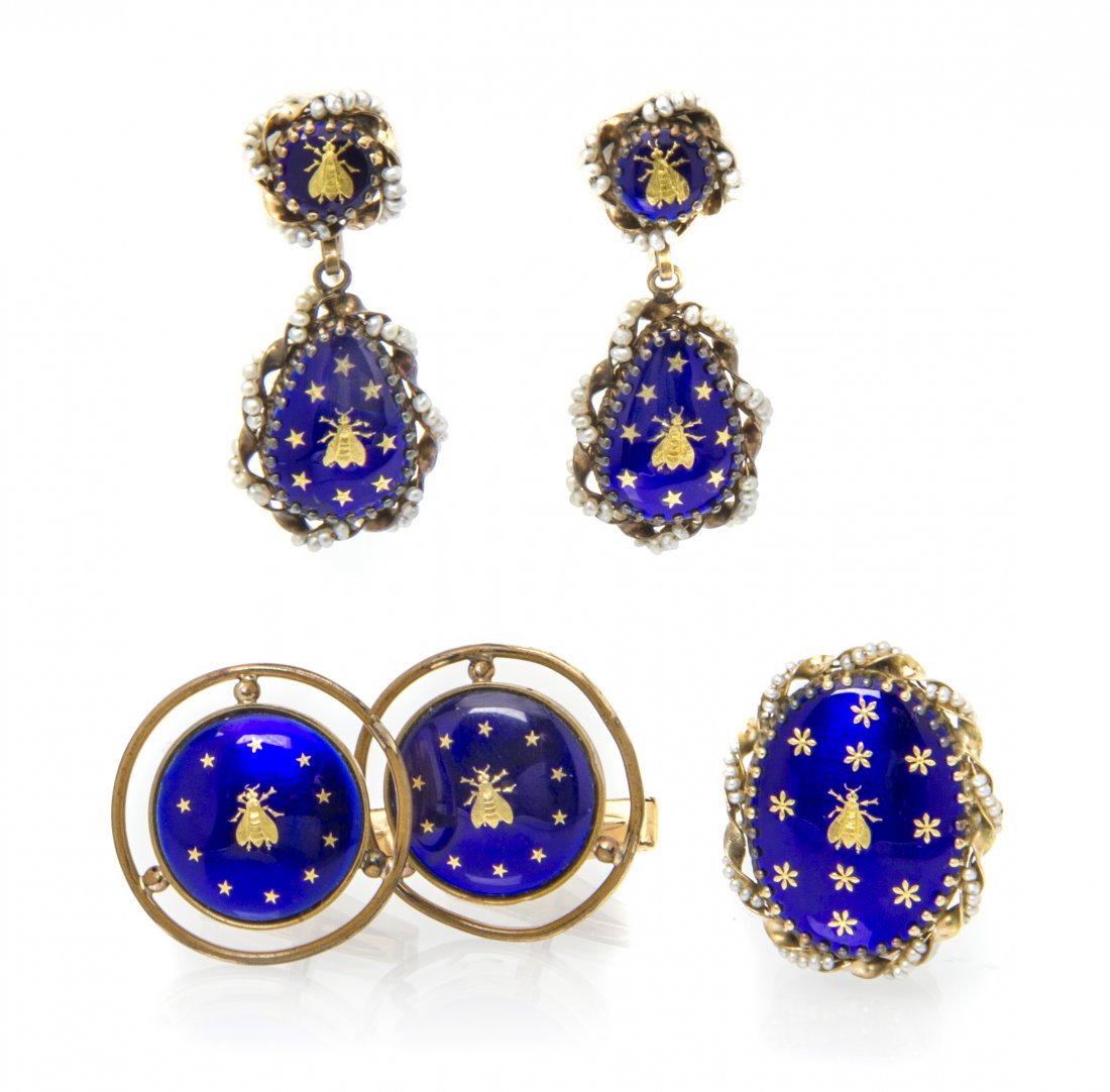 A Collection of Enamel Jewelry, 17.90 dwts.: A Collection of Enamel Jewelry, consisting of a pair of 14 karat yellow gold screwback earrings with blue enamel plaques accented with gilt bee and star detail surrounded by wire strung seed pearls, a
