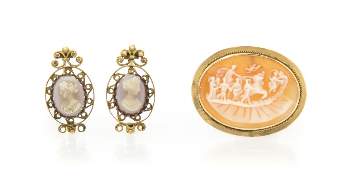 A Collection of Cameo Jewelry, 5.20 dwts.: A Collection of Cameo Jewelry, consisting of a pendant/brooch containing an oval carved shell cameo depicting a Classical scene within a 14 karat yellow gold bezel setting, together with a pair of ova