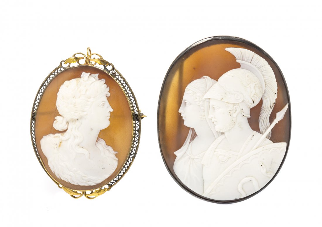 A Group of Shell Cameo Brooches,: A Group of Shell Cameo Brooches, one brooch depicting a Classical Trojan warrior and female in period dress, both in profile, together with another brooch depicting a Classical beauty in profile. Prop