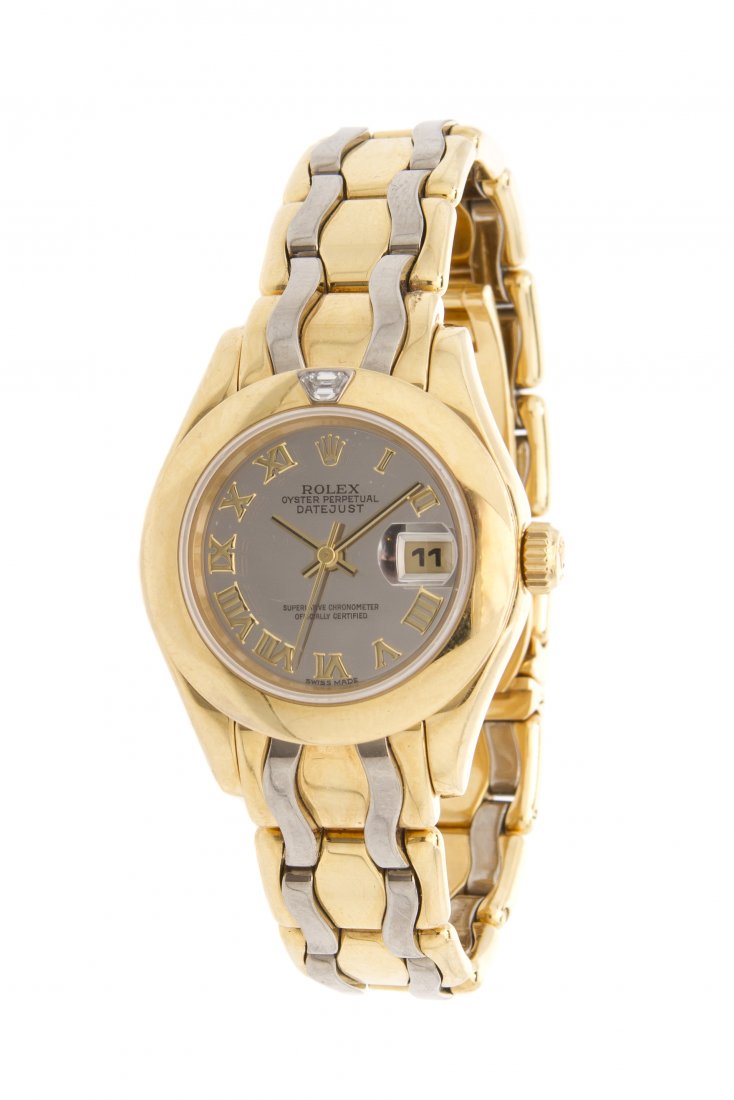 An 18 Karat Gold and Diamond Ref. 80328 Pearlmaster Mas: An 18 Karat Gold and Diamond Ref. 80328 Pearlmaster Masterpiece Wristwatch, Rolex, 28.00 mm case diameter, polished silvered dial signed ROLEX, applied gilt Roman numerals, gold baton hands with cente
